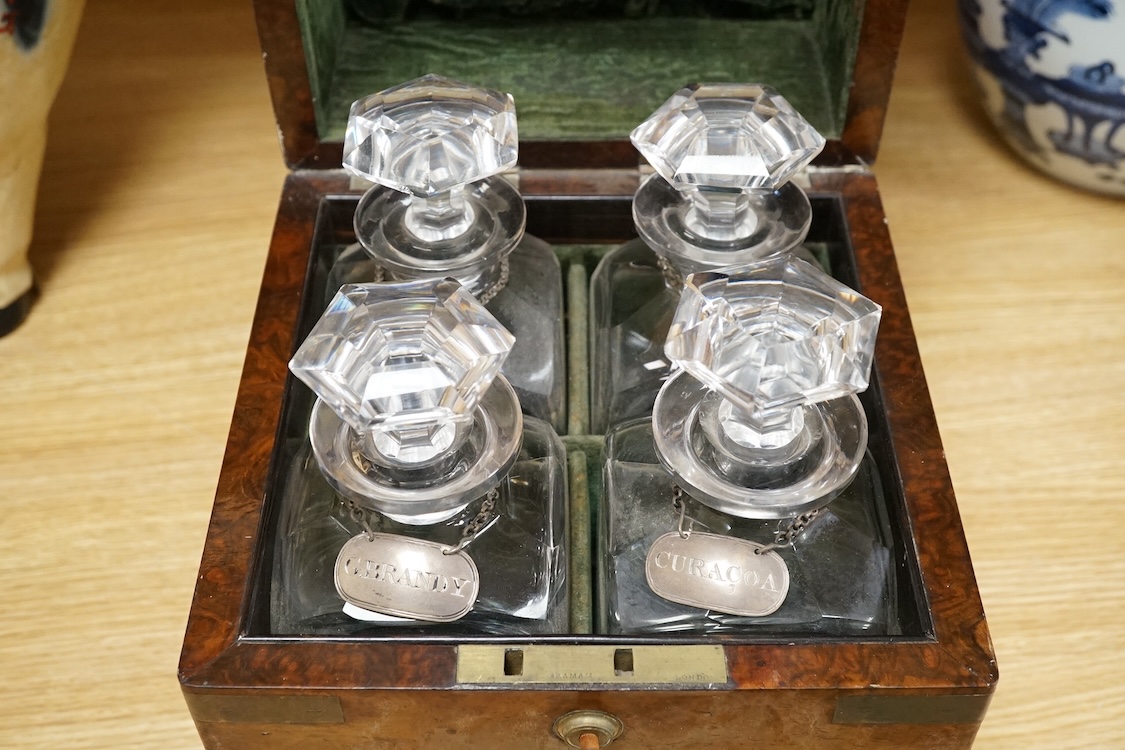 A small group of collectable silver including a George III silver cream jug, London, 1804, height 95mm, three silver vesta cases, two pill boxes, an envelope stamp case, two Georgian toddy ladles, one unmarked, together